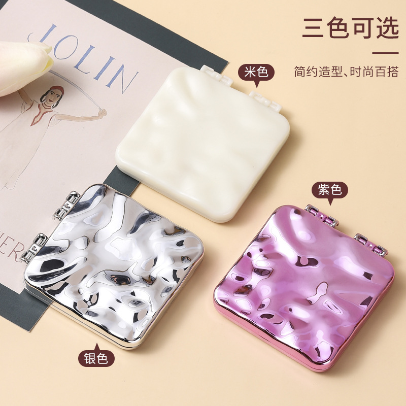 Espejo pequeño portátil mini espejo de maquillaje portátil de doble cara dormitorio de estudiantes espejo plegable de mano hogar hembra