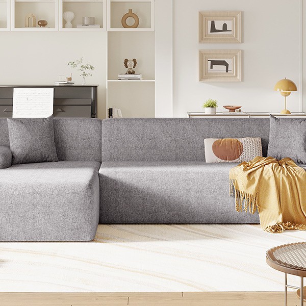 Art de arena minimalista para la sala de estar doméstica, suelo moderno y pequeño sofá de tela de casa simple