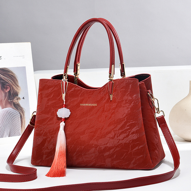 El nuevo estilo chino de estilo chino 2024 nuevo bolso de mujer gran capacidad bolso de madre bolso de hombro bolso de mochila