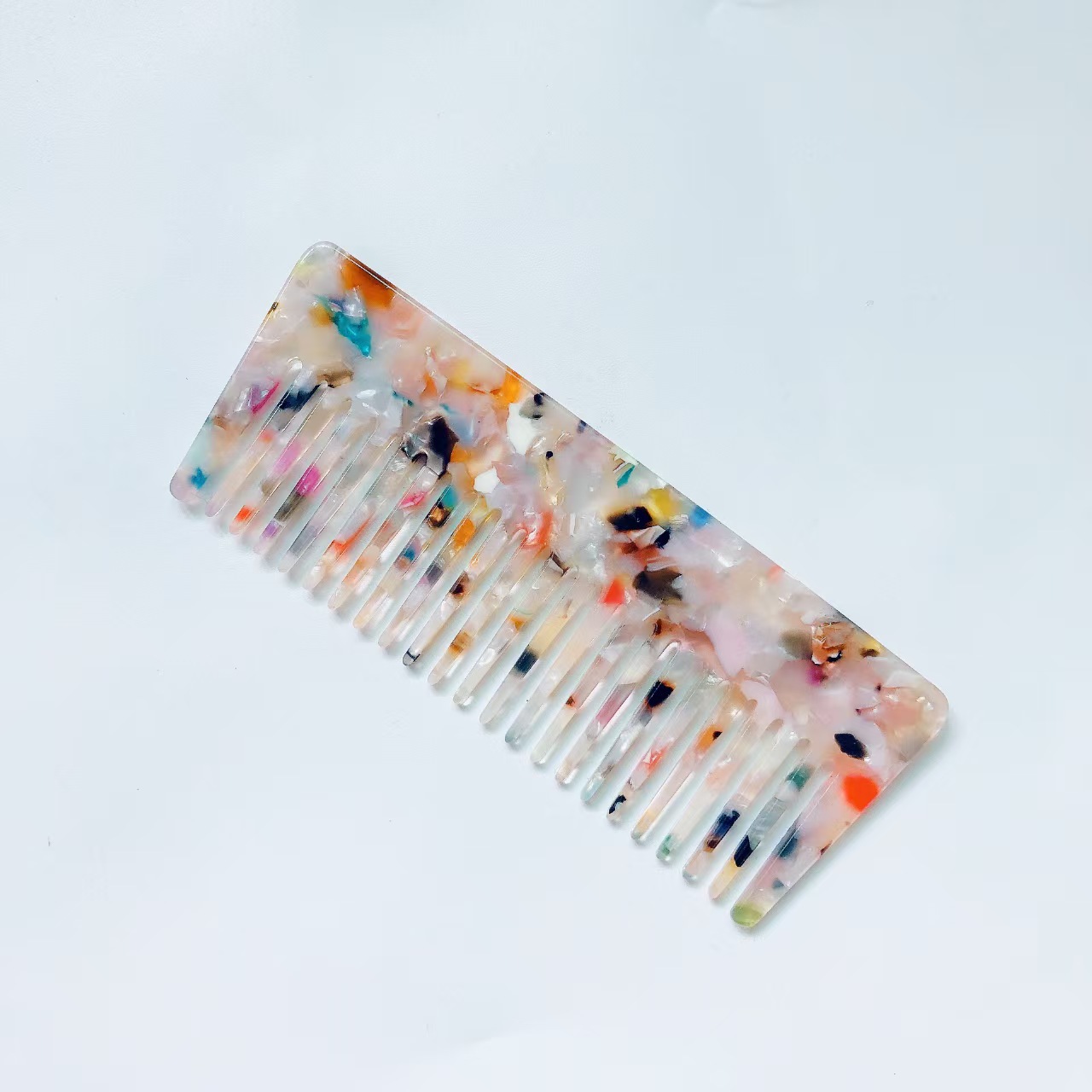 Exportación transfronteriza a Japón y Corea del Sur peine de dientes anchos de venta caliente fibra ácida acetato ecológico esponjoso peine para mujer peine para el cabello seco y húmedo