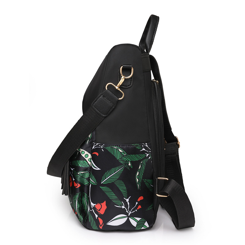 Comercio exterior al por mayor 2023 nueva mochila antirrobo de nailon para mujer casual moda color multifunción mochila de doble uso