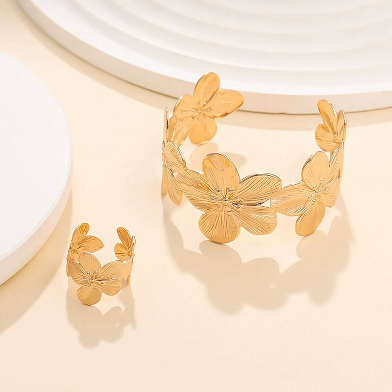 Europa y los Estados Unidos moda transfronteriza venta caliente flor simple personalidad universal mujer raqueta de calle conjunto de decoración joyas de moda