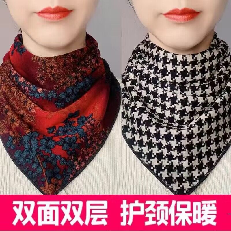 新しいマフラーの女性は秋冬に両面の花を厚くして首を保護します。|undefined