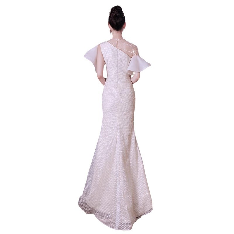 Tendencia vestido de noche mujer 2026 nueva moda industrial pesada hombro inclinado anfitrión vestido de cola de pescado francés para adultos