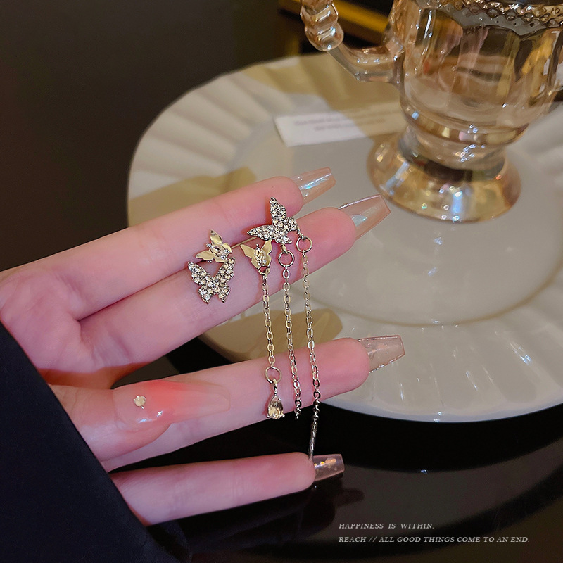 Retro asymmetrical small design earrings