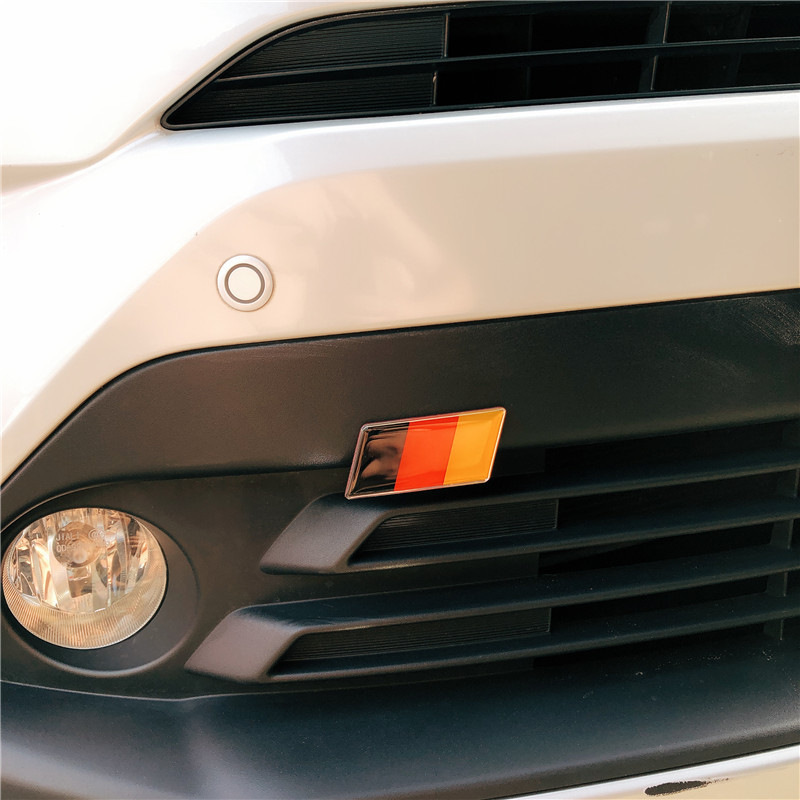 German, American, British, French Flags, Korean, Italian, Spanish, Russian Grille Center Logo