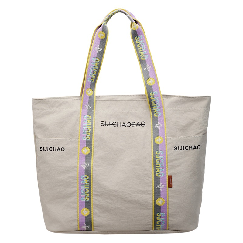 Bolsa de tela de nylon de gran capacidad para mujeres bolsas de impresión de letras de la ciudad simple viaje bolso de hombro bolso de mano ocio