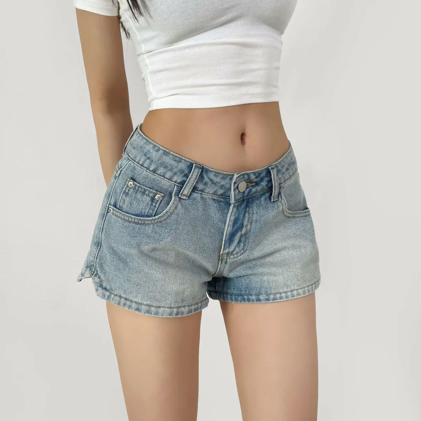 코믹한 바디/다리가 길어지는 사이드 곡선 슬릿 핫팬츠 아메리칸 핫걸 로우웨이스트 여성용 다용도 데님 반바지