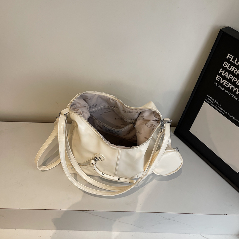 Bolsos estilo coreano bolso de axila de viento perezoso 2025 nuevo bolso de alta capacidad bolso de hombro ancho bolso casual de un solo hombro