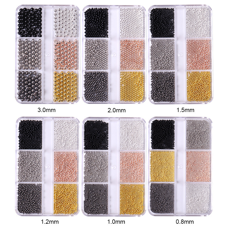 Accesorios de uñas transfronterizos al por mayor 6-grid nail aleación de acero cuentas oro plata tamaño mezclado decoraciones de uñas al por mayor