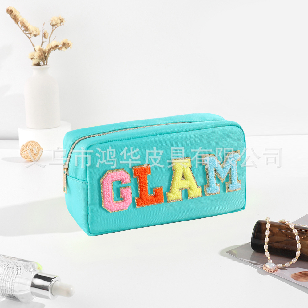 Transfronterizo amazon popular toalla bordada carta de nylon bolsa de cosméticos bolsa de almacenamiento de gran capacidad informal de las mujeres a prueba de agua