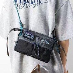 国境を越えたトレンディなブランドのシンプルなカジュアルアウトドア小型バックパック男性と女性のカップルショルダークロスボディバッグストリートトレンディな携帯電話バッグ卸売