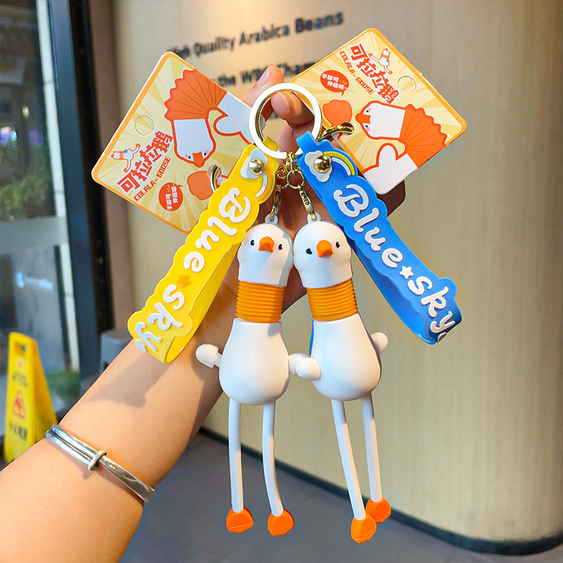 Creative cute long leg Lala goose retractable neck key chain exquisite couple car schoolbag pendant gift wholesale