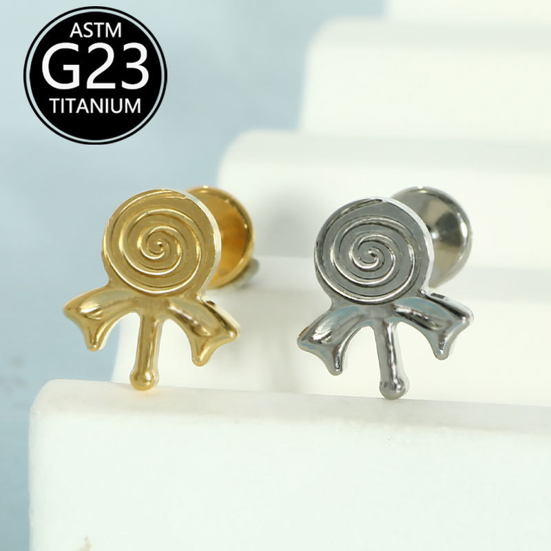 Silver pointed spike labret stud material detail
