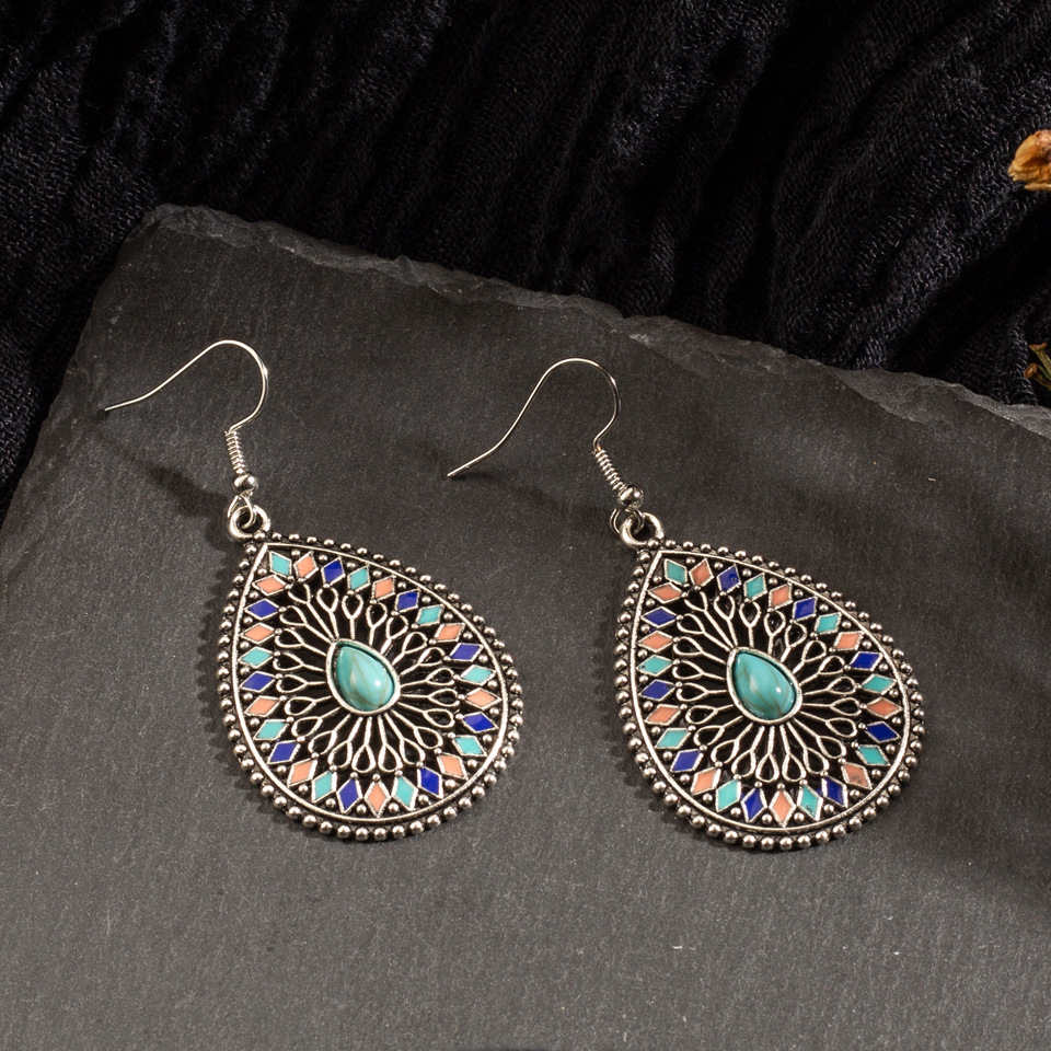 Bohemian Alloy Hollow Drop-shaped Colored Diamond Earrings Wholesale display picture 6