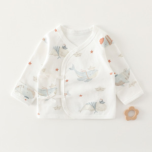 Baby whale half back