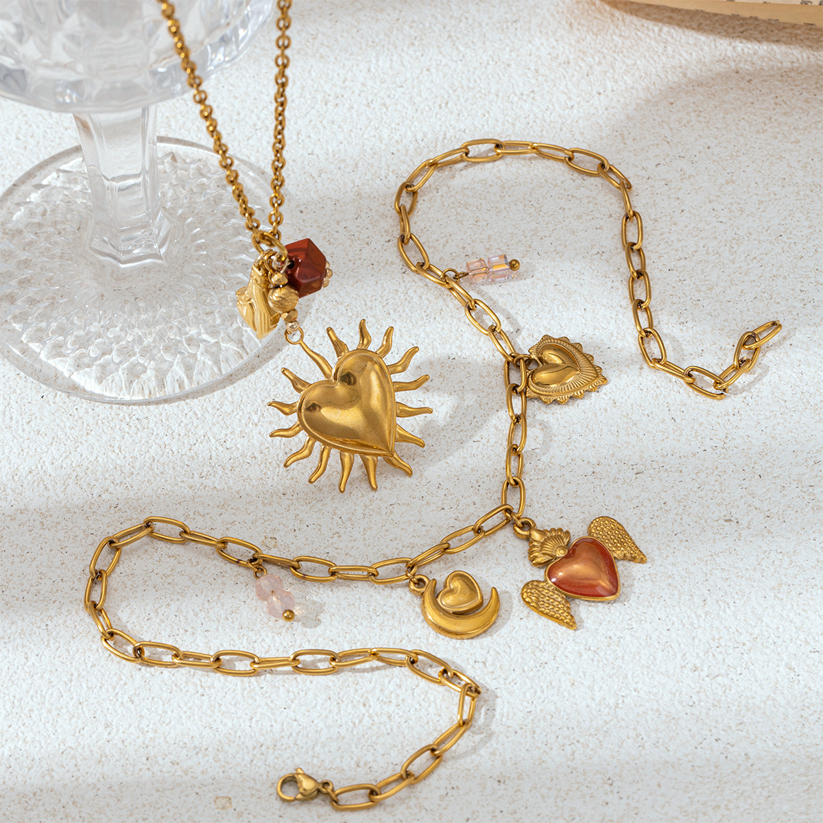 Collar de acero inoxidable TENA Europa y los Estados Unidos nicho ligero de lujo sol amor multi-colgante conjunto de joyería universal venta caliente transfronteriza