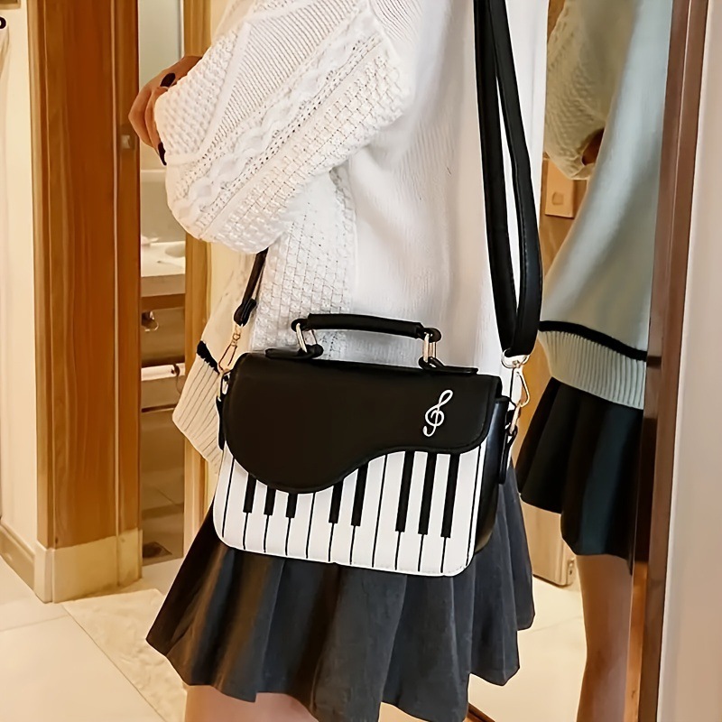 Borsa a spalla donna con ricamo note musicali e piano_voghion.com