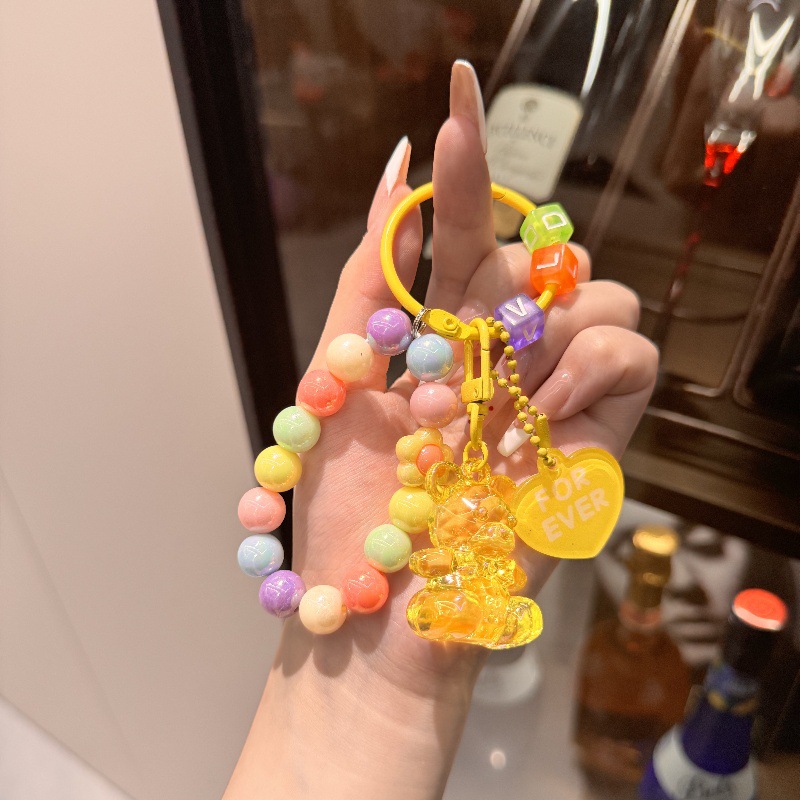 Nuevo llavero con cuentas de oso acrílico colgante de bolso creativo pequeño regalo con cuentas de color fresco al por mayor