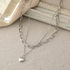 Fashionable retro jewelry, necklace heart-shaped, simple and elegant design, bright catchy style