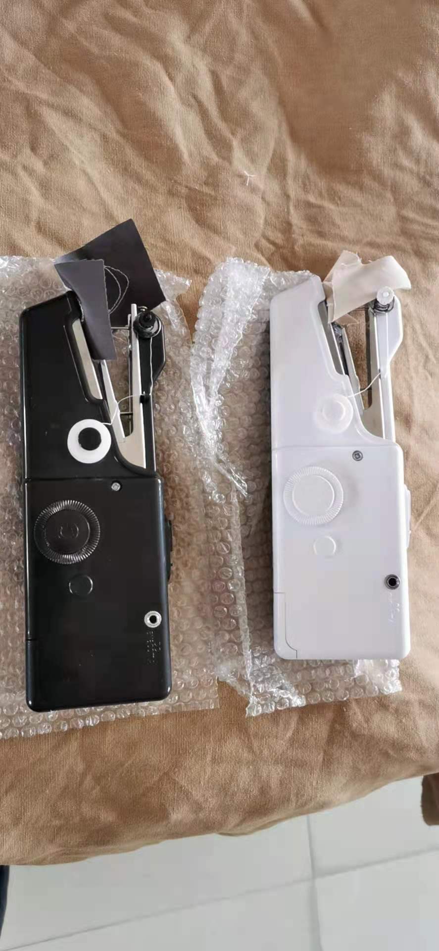 Máquina de coser portátil de mano doméstica de punto transfronterizo de mano mano de punto de mano de bolsillo micro máquina de coser