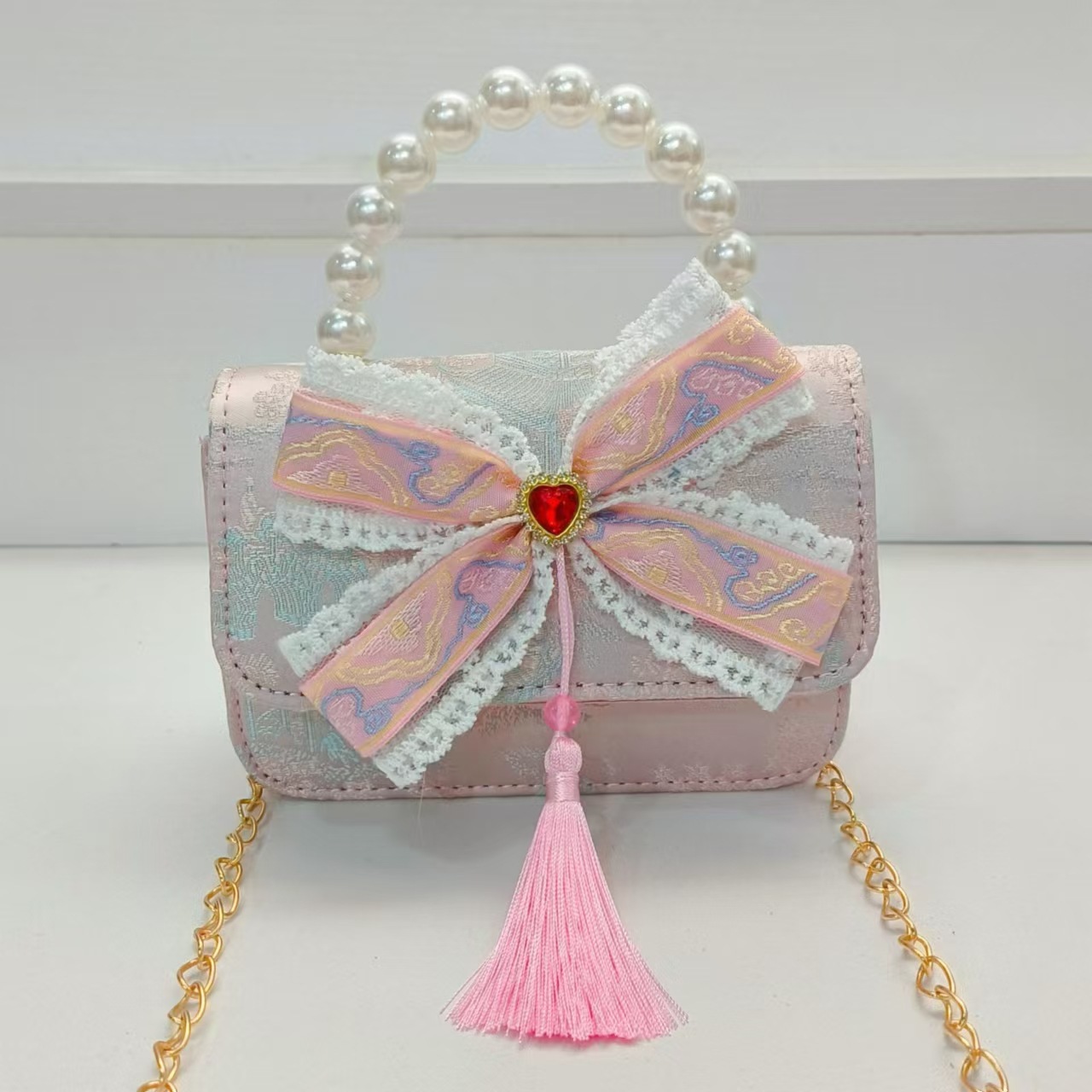 Guofeng arco princesa bolso de perla bolso de hombro bolso de cambio bolso pequeño bolso cuadrado bolso accesorios de ropa de niñas