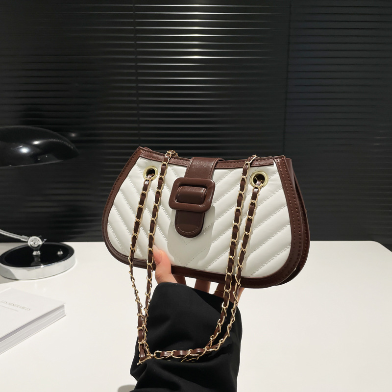 Moda y exquisita empalme de primavera de 2025 nueva cadena de diamante simple bolso de mano de hombro