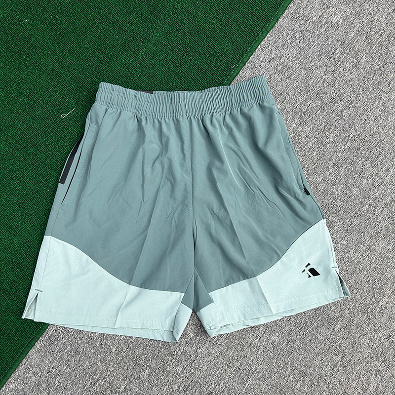 Fabricantes al por mayor de pantalones cortos deportivos para hombres de velocidad de hielo seco maratón de verano delgado entrenamiento de acondicionamiento físico panty