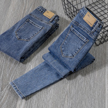 蓝色修身牛仔裤女2024秋冬加绒紧身高腰显瘦九分弹力小脚铅笔裤子