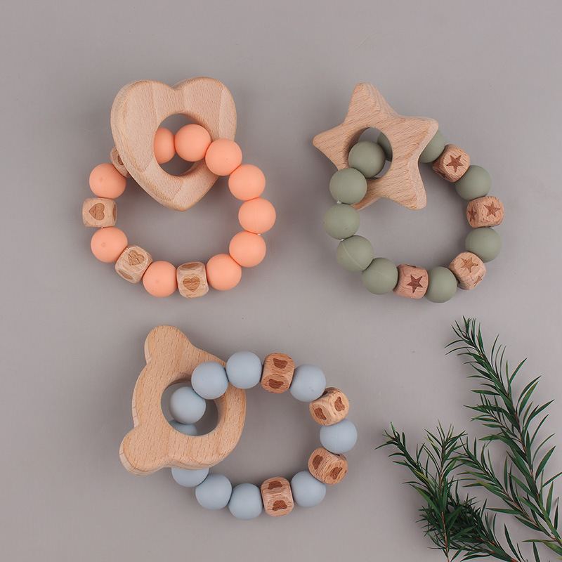 La pulsera de mordedor para bebé de juguete de haya 2025 puede morder el mordisco del bebé