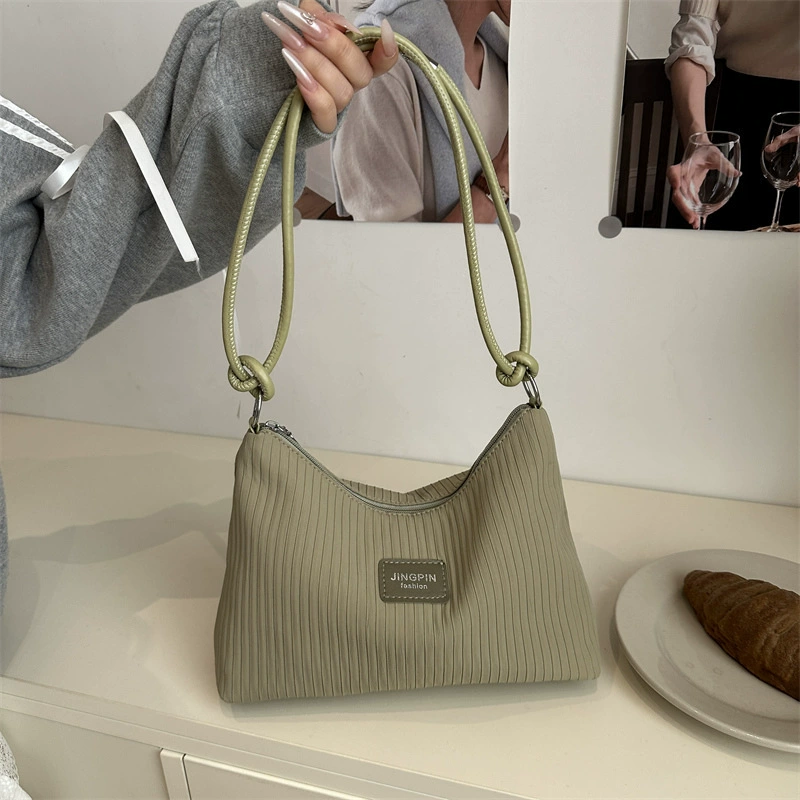 2025 повседневная вместительная сумка через плечо с тиснением в полоску, новый летний стиль, однотонная, для повседневного использования