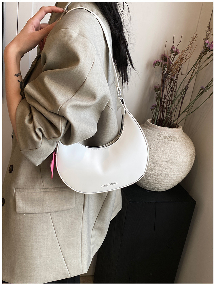 Cross-border women's bag 2024 New style, trendy texture, versatile, ins fashion single-shoulder armpit bag, small flower pendant, crescent moon bag undefined