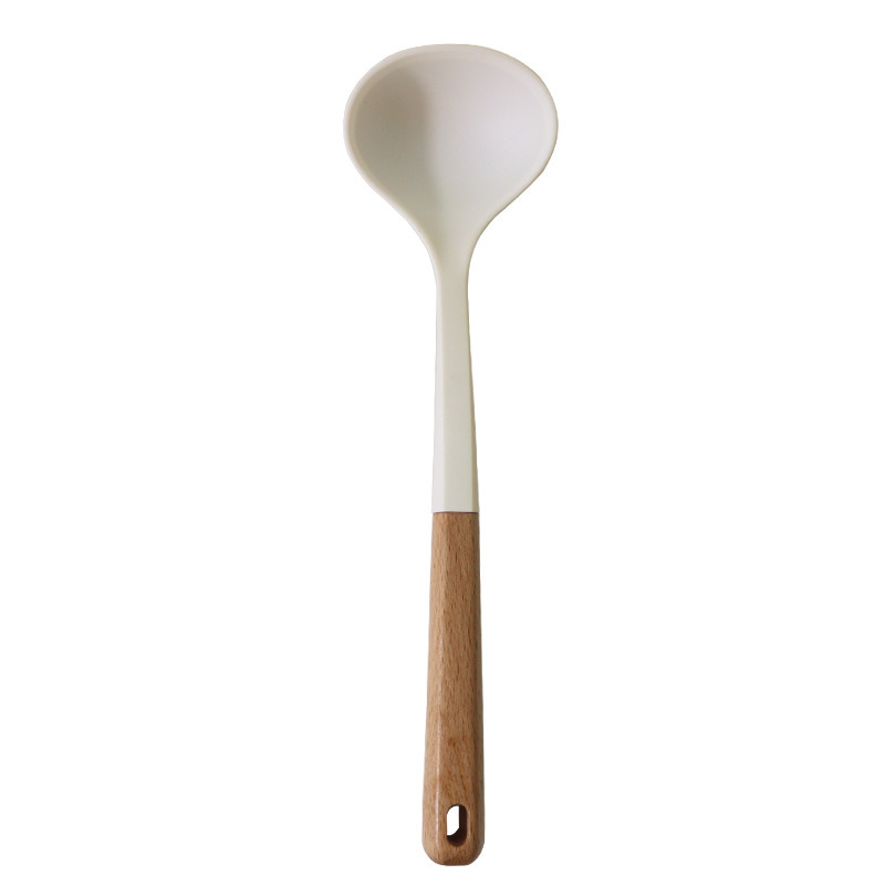 Cuchara de sopa de espátula de silicona transfronteriza Juego de 13 piezas de sartén antiadherente Pala de silicona de grado alimenticio Juego de utensilios de cocina de silicona blanca lechosa al por mayor