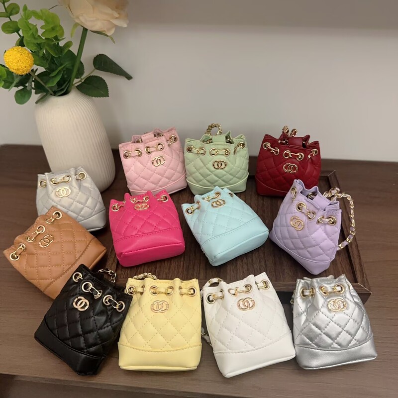Small Chanel-style diamond-pattern chain bucket bag, new trendy design, coin purse, earphone storage bag, backpack, and bag charm