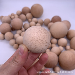 木造のケヤキの丸いボールの原木の色の木のボールの大きいボールの色のボールの木の玉の手作りのdiyは現物を穴に開けることができます。