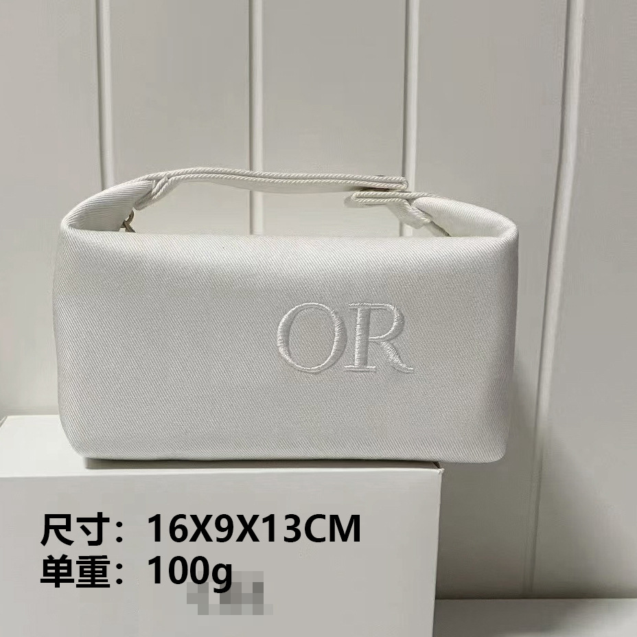 新しい化粧品バッグ、国内向けピンクのスペースコットン、超柔らかさ、ポータブル、高級ハンドバッグ、化粧品収納バッグ