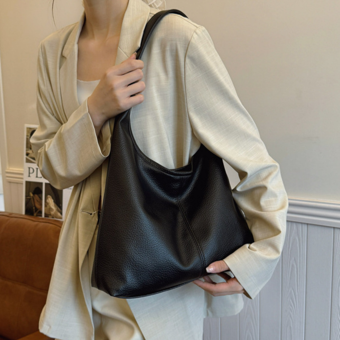 Bolso de cubo portátil de sentido avanzado transfronterizo Bolso de hombro de moda de todo fósforo retro femenino Bolso de viaje de gran capacidad casual