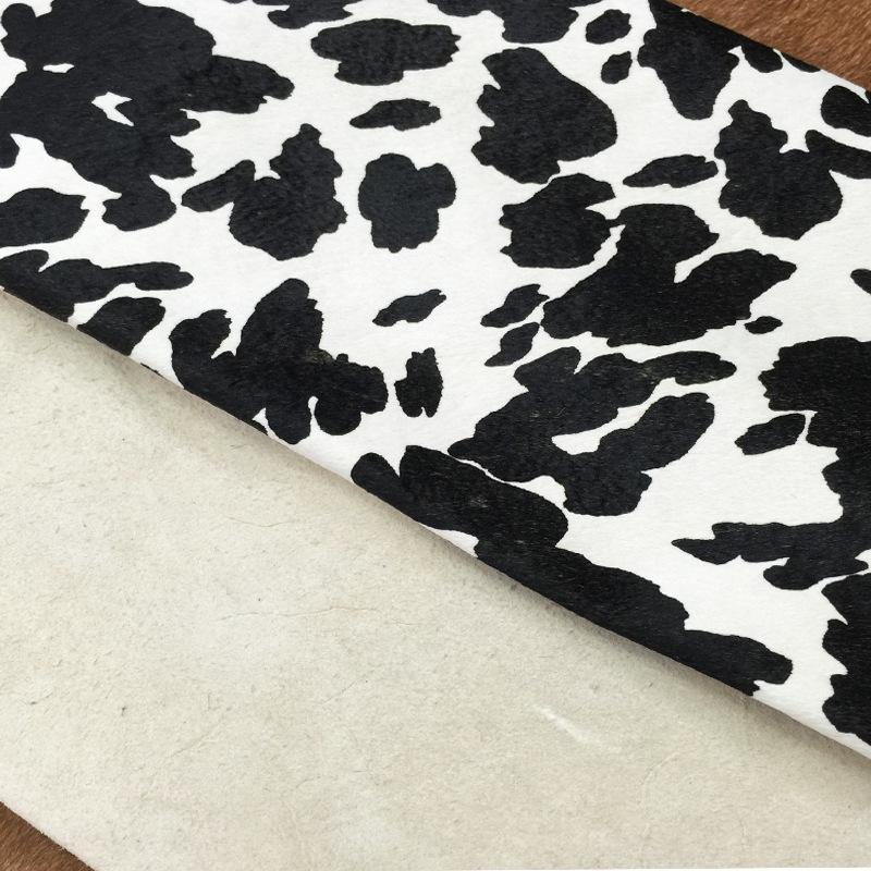 头层牛皮黑白奶牛纹箱包鞋真皮供应牛毛印花皮革