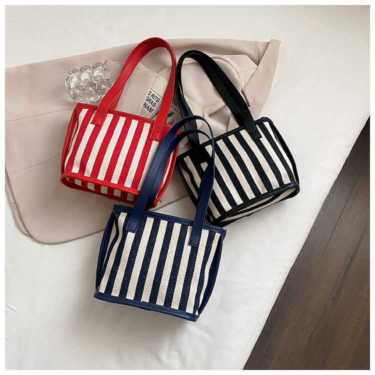 Korean Clashing Color Stripe Canvas Storage Bag Wholesale Nihaojewelry display picture 2