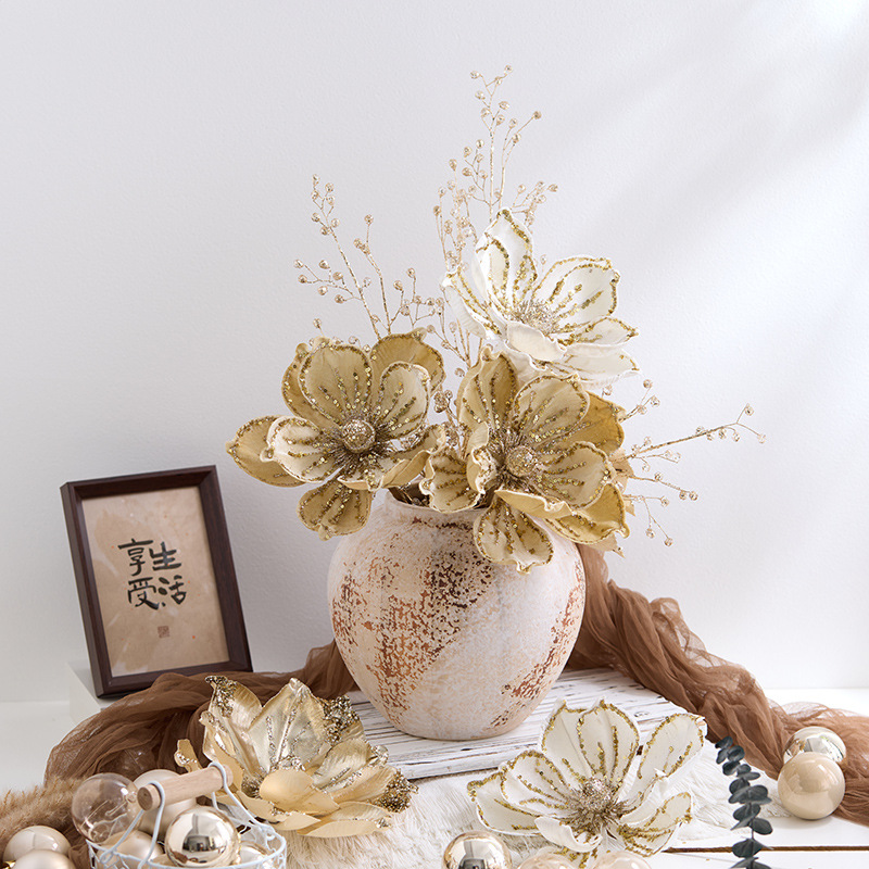 Nuevos productos transfronterizos decoraciones navideñas flores de navidad champagne oro de alta calidad simulación magnolia decoración floral para el hogar