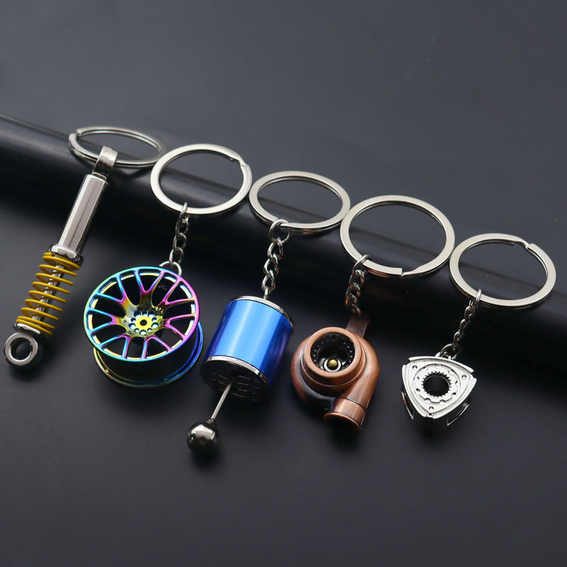 Cross-border car keychain shock absorber rotor hub gearbox turbocharger keychain pendant factory wholesale