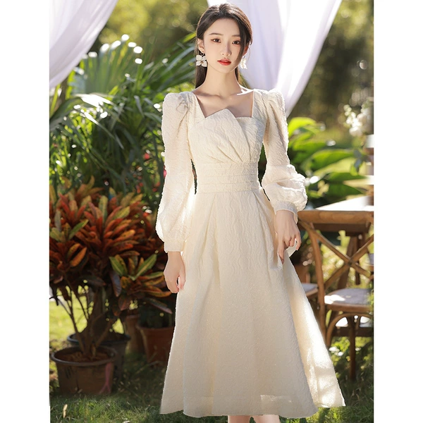 Long, champagne color, mid-length