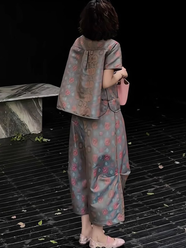 2025年新作夏の美しい服装、ゆったりとした新しい中国風のボタンプリントトップスとワイドレッグパンツのツーピーススーツ|undefined