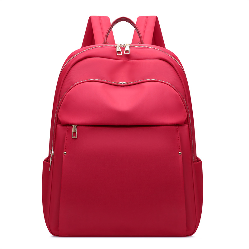 Comercio exterior al por mayor 2024 nuevas señoras de gran capacidad mochila para computadora de 15 pulgadas moda simple mochila de viaje ligera