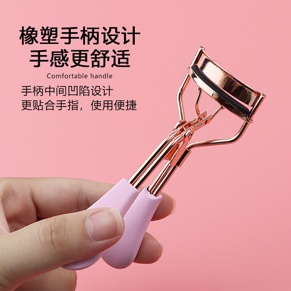 Golden curling eyelash curler contains rose