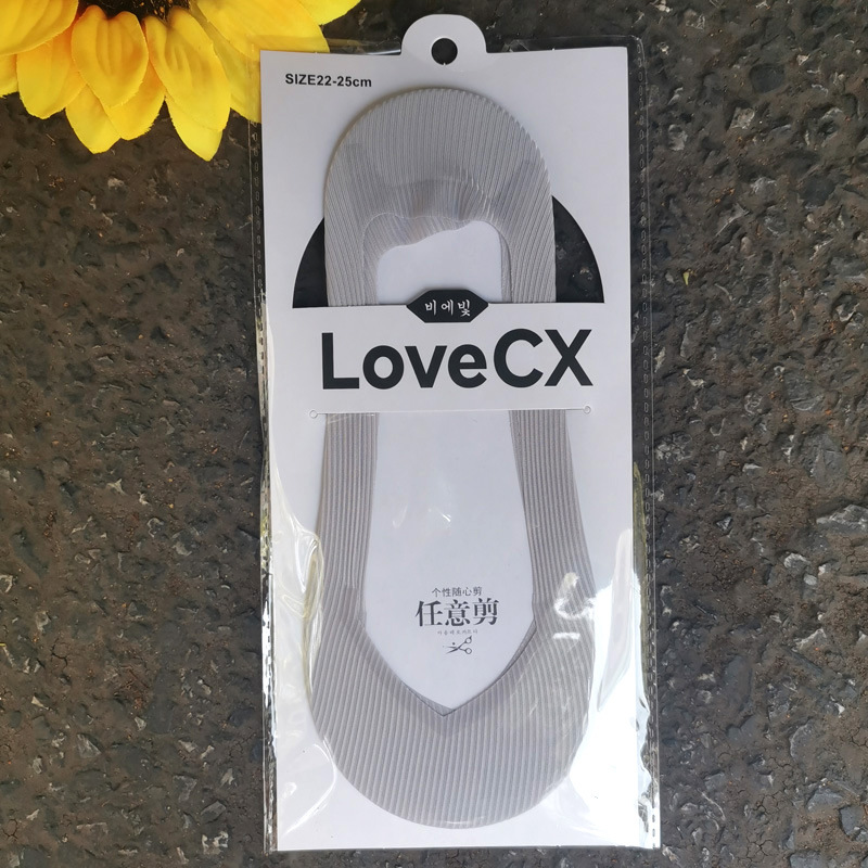 Verano de las mujeres nuevo corte arbitrario de hielo de seda de silicona antideslizante calcetines invisibles de color sólido sin costuras de las mujeres calcetines de barco de corte bajo al por mayor