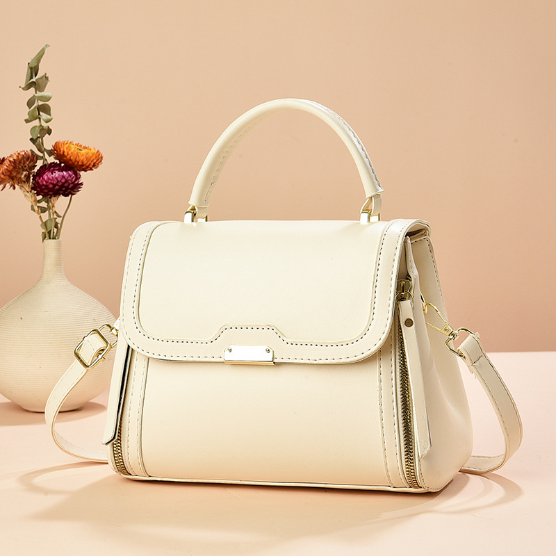 Bolso de mano bolso de comercio exterior de Taizhou bolso de mujer bolso de mensajero de un solo hombro de color sólido bolso de madre simple de moda de todo fósforo bags