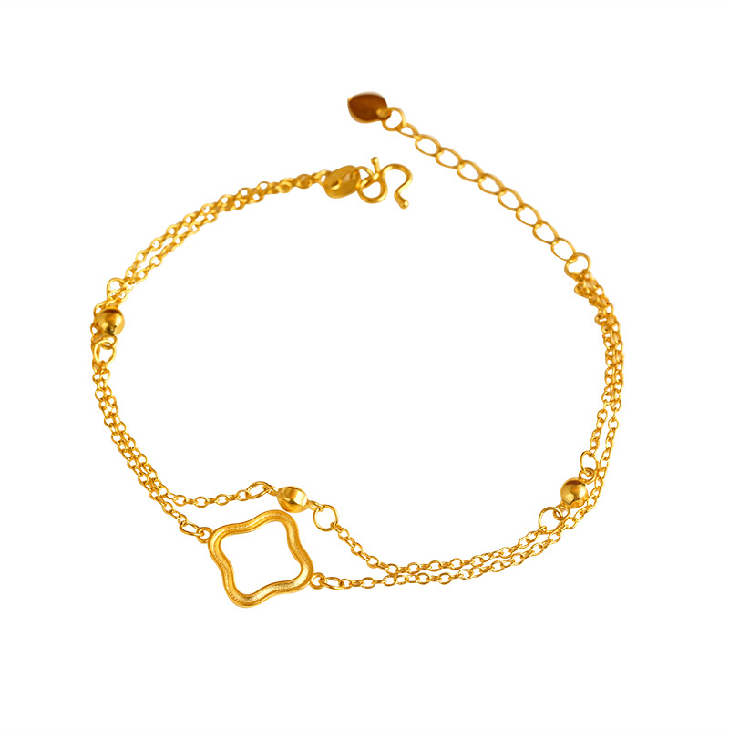 Aleación de cobre de Cercanías de moda todo partido pulsera de doble capa trébol de cuatro hojas pulsera de doble línea joyería de suministro directo de fábrica de las mujeres