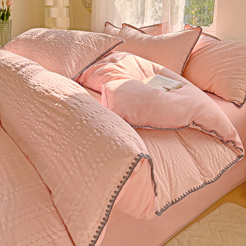 Cama de algodón lavado cepillada simple de cuatro piezas Four Seasons 2025 nueva sábana funda de edredón sábana ropa de cama de dormitorio