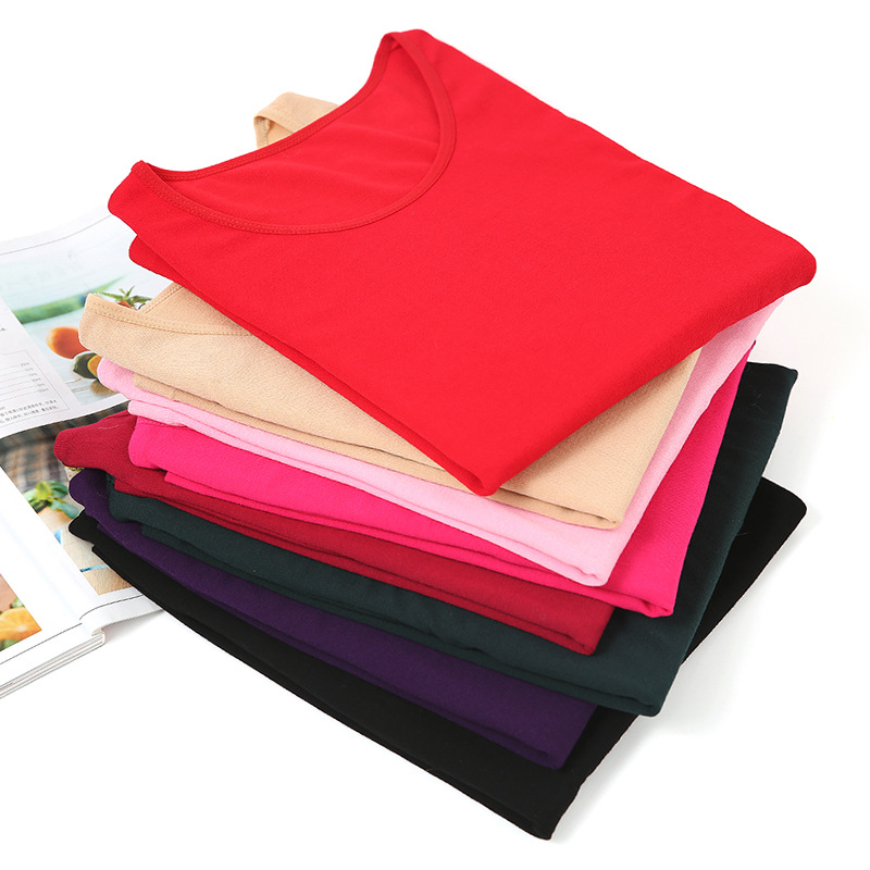 Ropa interior térmica de alta elasticidad con retención de calor de tres segundos para mujer, conjunto de top y pantalón de cuello redondo de color sólido, delgado y cálido para invierno, a la moda.